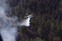 Mantienen tres órdenes de gobierno trabajos de liquidación de incendio de Libres